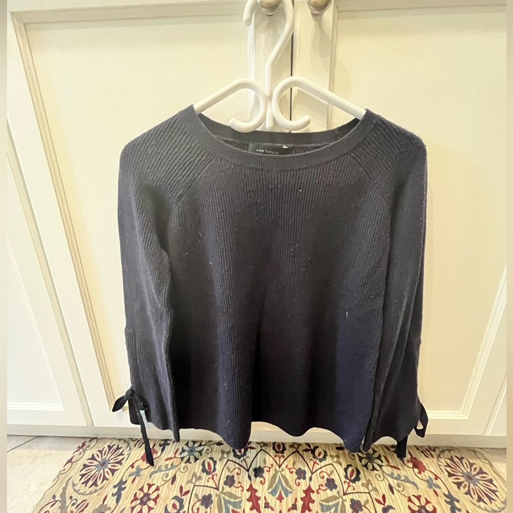 Cute Ann Taylor Navy Sweater.  Bows at wrists.